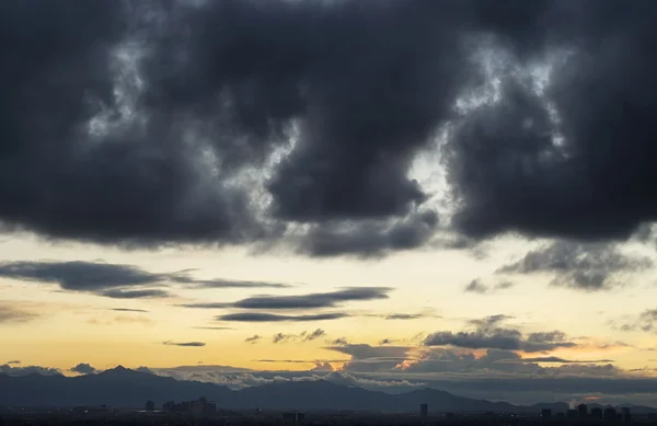 Stormy sky over city — Stock Photo, Image