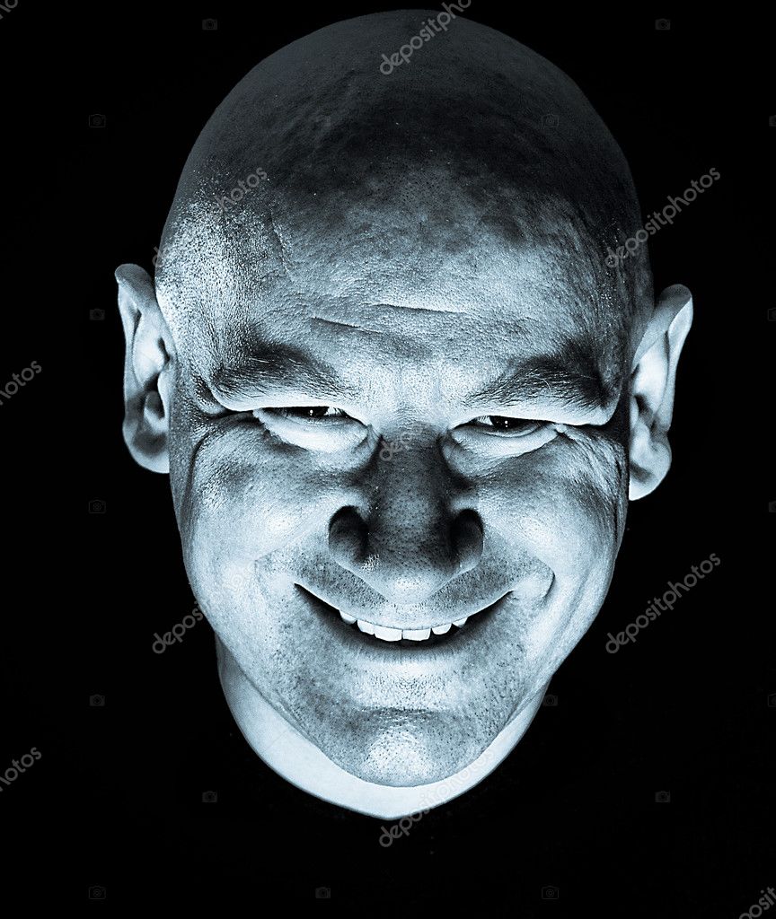 Menacing smile hi-res stock photography and images - Alamy