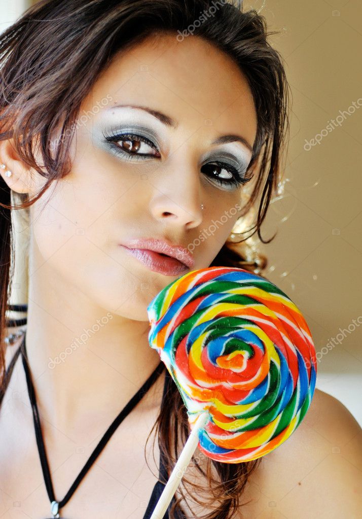 abajo Circular Deber Sexy girl with candy lollypop Stock Photo by ©AVFC 8772478
