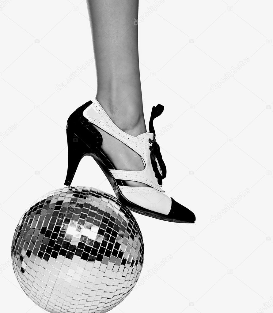 Dance shoe on disco ball