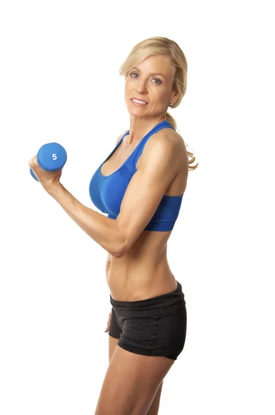 Attractive woman working out with dumbells — Stock Photo, Image