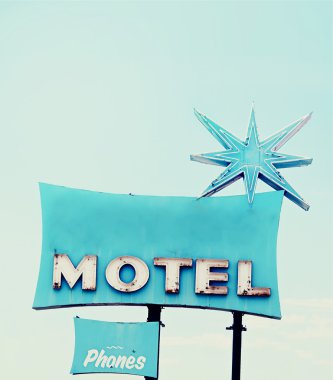 Old motel sign near Route 66, USA clipart