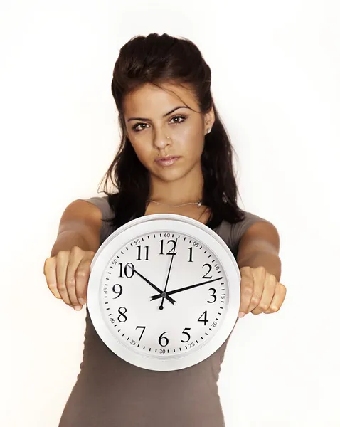 Young woman holding a clock. — Stock Photo, Image