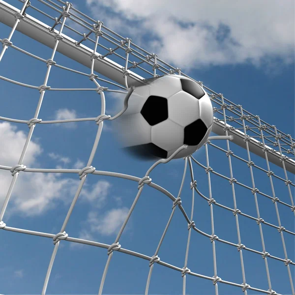 Футбольный мяч в сетке — стоковое фото