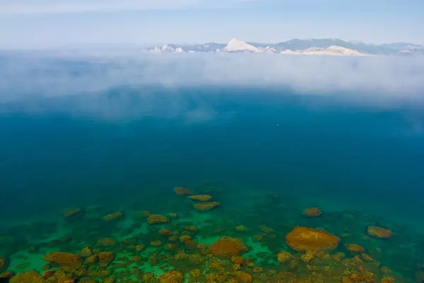 Stock image Beautiful emerald sea in a mist