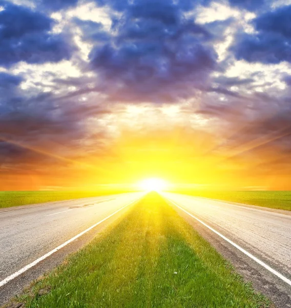 stock image Asphalt road at the sunset