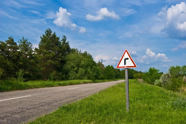 stock image Sign on asphalt rural road