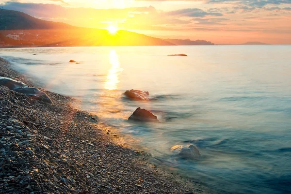 Puesta de sol en un mar —  Fotos de Stock