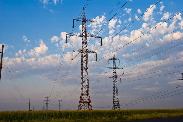 Electric mast among a fields — Stock Photo, Image