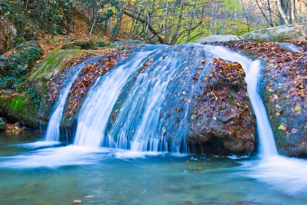 Beautiful water cascade on a mountain river — Stock Photo, Image