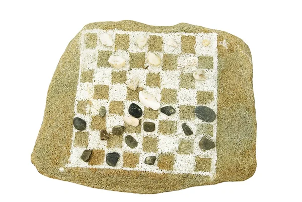 Schackbräde på en sten — Stockfoto