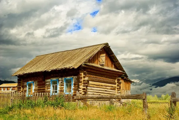House is in a village — Stock Photo, Image