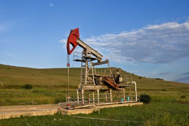 Oilwell in a fields clipart