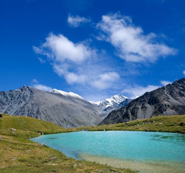 Lake in a mountains clipart