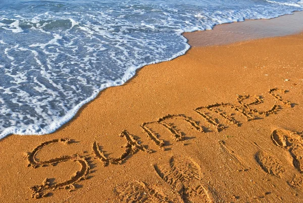 Palabra de verano en una costa del mar — Foto de Stock