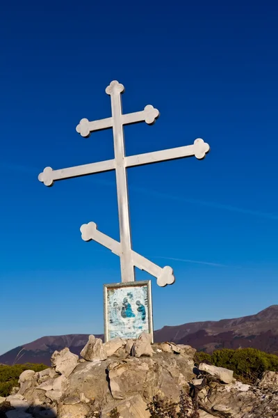 Ghristisches Kreuz in den Bergen — Stockfoto