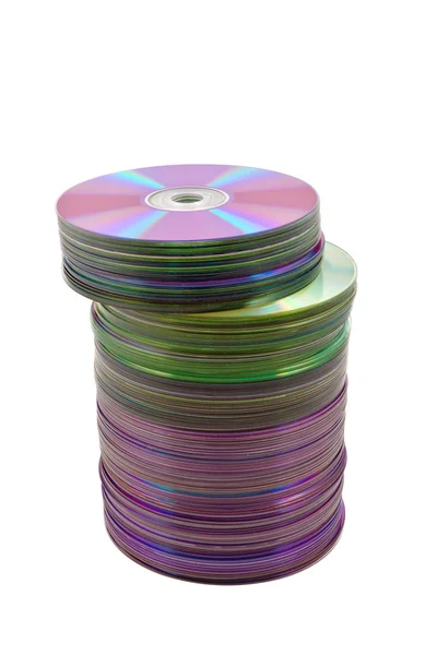 Un mucchio di compact disk su sfondo bianco — Foto Stock