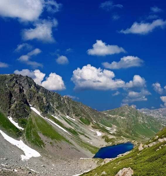 Seven colors lake in a caucasian mountains — Stock Photo, Image
