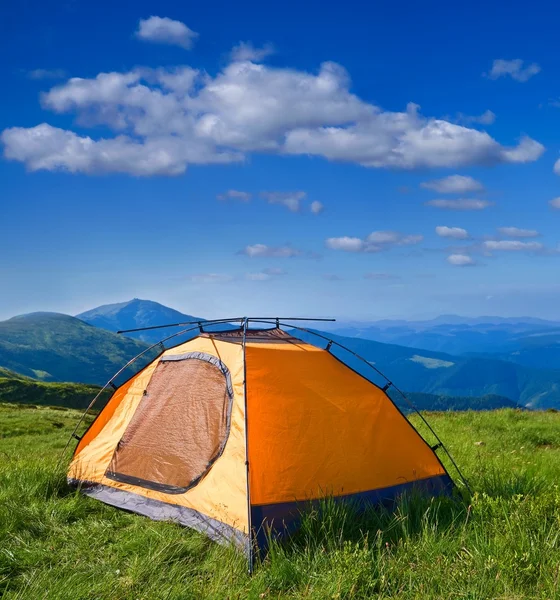 Orange touristic tent in a mountains — Stock Photo, Image