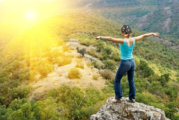 Girl flying to the sun — Stock Photo, Image