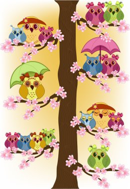 Lot of owls sitting in a tree clipart