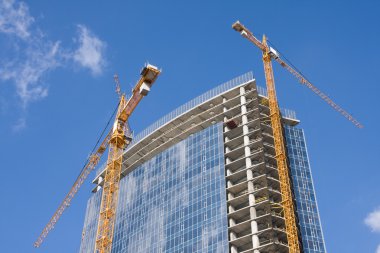 Cranes and building construction clipart