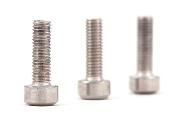 Bolts on table — Stock Photo, Image