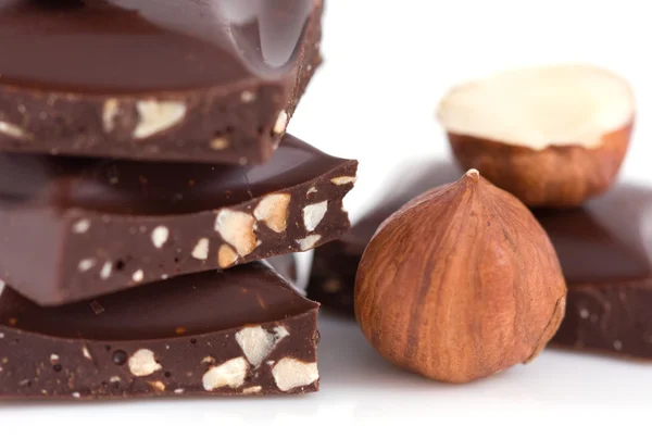 Chocolate and hazelnuts — Stock Photo, Image