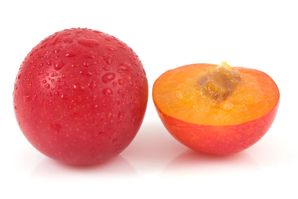 Red plums on isolated — Stock Photo, Image