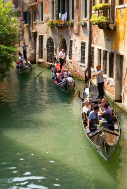 Tourists travel on a gondolas clipart