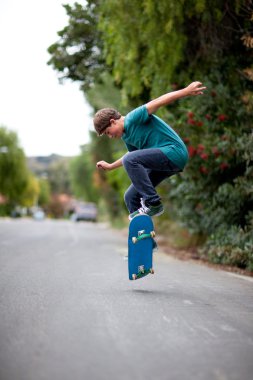 Teenager Skateboarding clipart