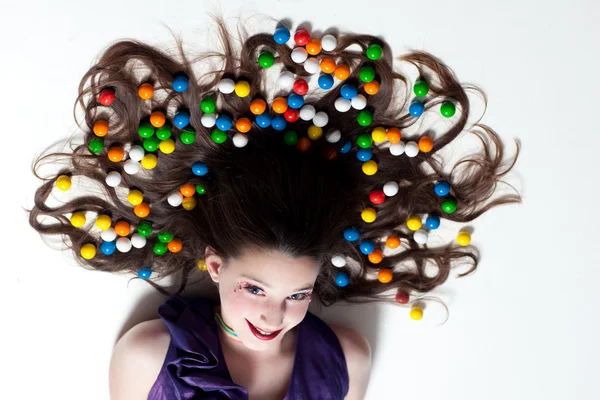 Jolie fille avec du maquillage de bonbons — Photo