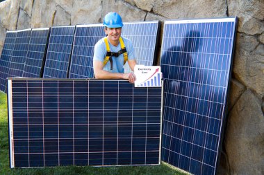 Handsome Man and Solar Panels clipart