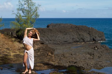 Pretty Woman in Kauai on a private Beach clipart