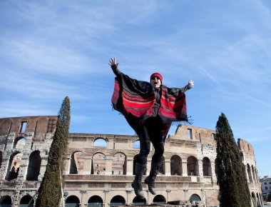 Woman jumping with scarf