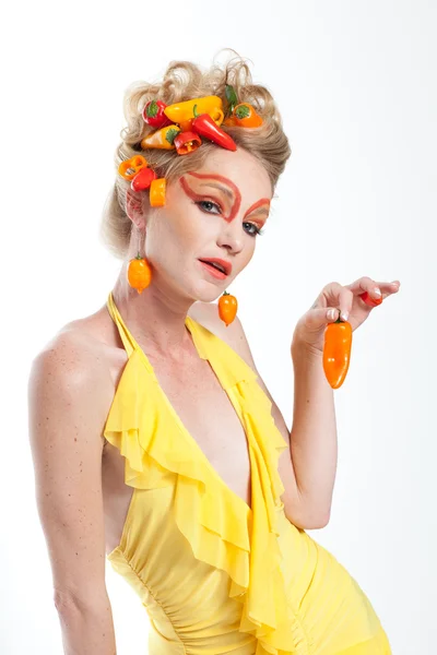 Beautiful Woman with Peppers Royalty Free Stock Photos
