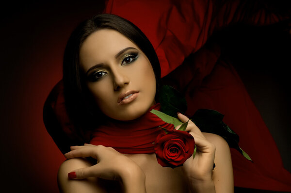 The very pretty woman with red neckerchief, with rose, sensual sexuality gaze...