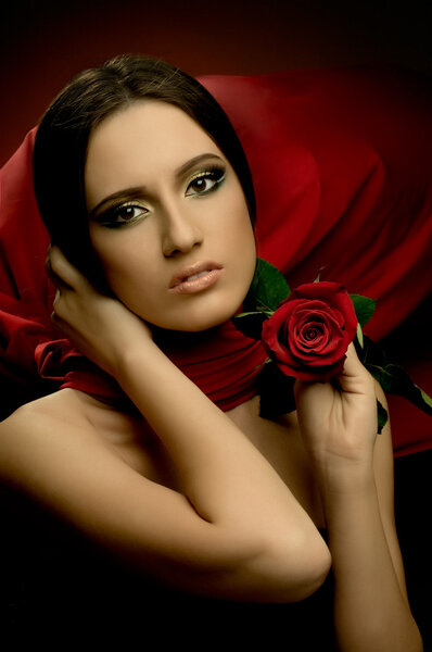 The very pretty young woman with red neckerchief, with rose, sensual sexuality gaze...