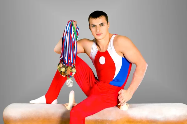 Gymnast with medals — Stock Photo, Image