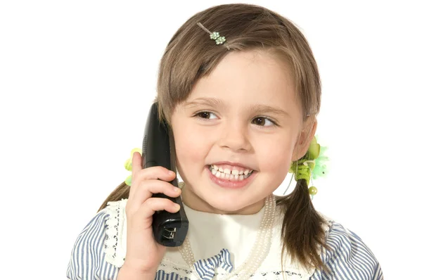 Маленька дівчинка з телефоном — стокове фото