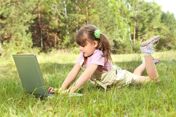 stock image Little girl with computer