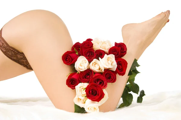 Pernas e rosas — Fotografia de Stock
