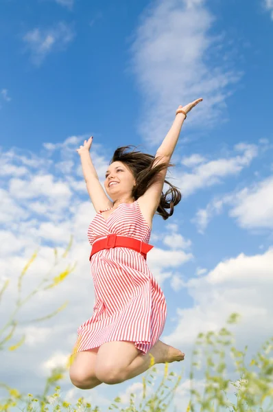 Vrouw in een stap-springen — Stockfoto