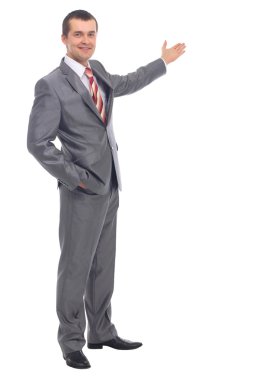 Business man presenting over a white background clipart