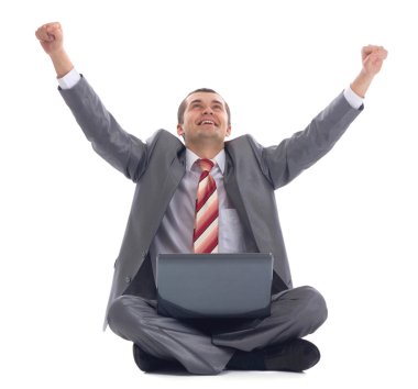 iş adamı onun başarı bilgisayar dizüstü bilgisayar ile kutluyor