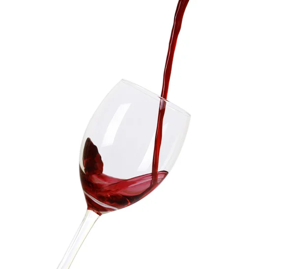Rotwein strömt aus einer Weinflasche herab — Stockfoto