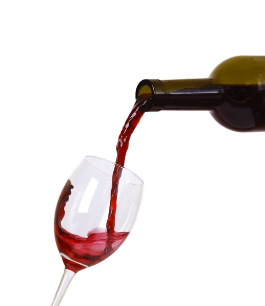Vinho tinto que desce de uma garrafa de vinho — Fotografia de Stock