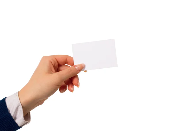 Hand holding an empty business card over white — Stock Photo, Image