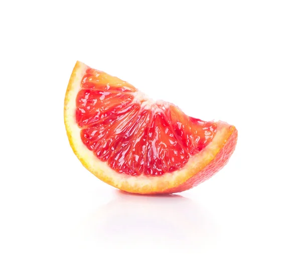 Bit av orange isolerad på vit — Stockfoto
