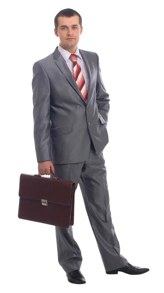 Ritratto di un giovane uomo d'affari felice con in mano una valigia — Foto Stock